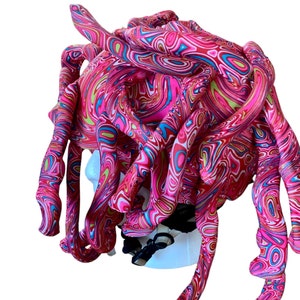 Ultimate, one of a kind helmet cover. Wild and crazy. Stand out one the mountain. Put a little spring in the crowded ski hill. Festive
