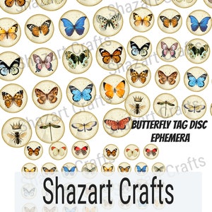 May include: A set of 36 round, cream-colored paper butterfly tag discs with gold trim. Each disc features a different butterfly illustration with various colors and patterns. The text "Butterfly Tag Disc Ephemera" is printed in black at the bottom of the image.