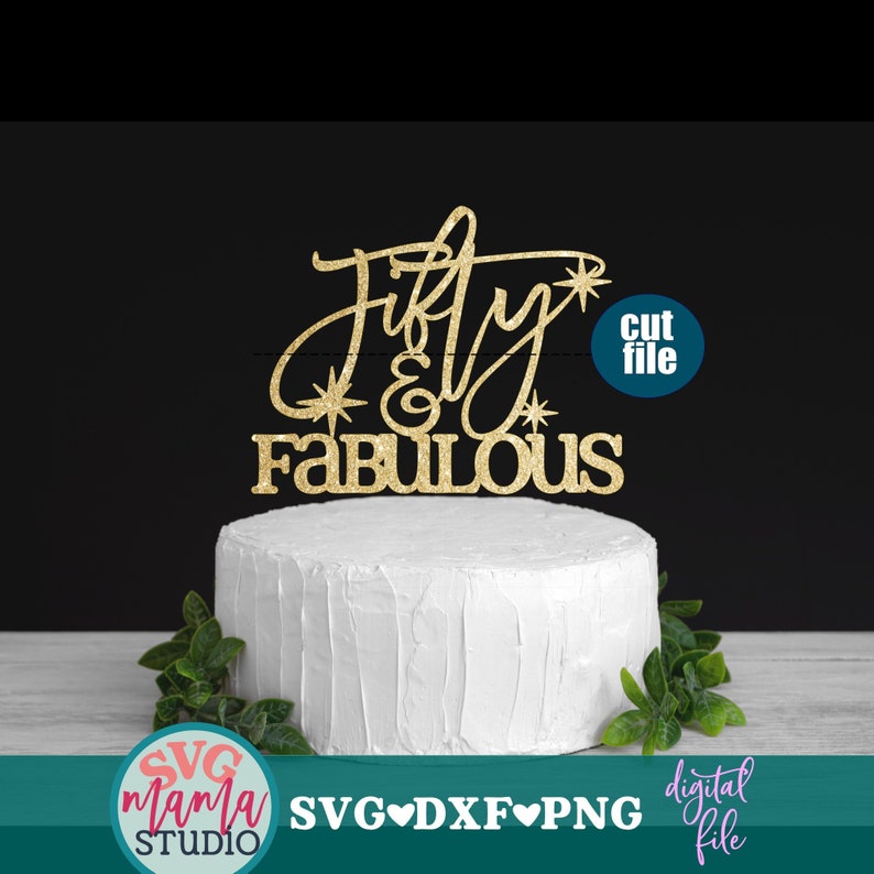 May include: Gold glitter cake topper with the text "Fifty & Fabulous" and a star design. The topper is on a white cake with green leaves in the background. The text "cut file" is in a blue circle on the right side of the image.