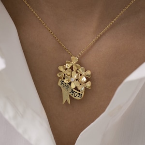 14K gouden diamanten bloemenketting: madeliefjeboekethanger