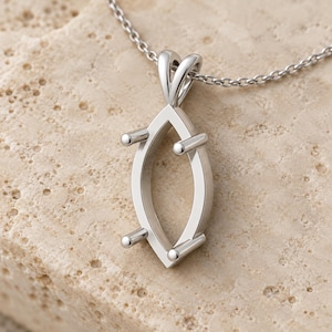 May include: A silver-toned metal pendant setting designed for a marquise-shaped gemstone, featuring four prongs and a triangular bail, suspended from a delicate matching chain link necklace.