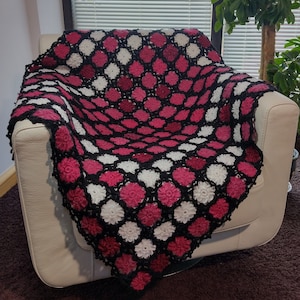 Afghan, blanket, throw (pinks, white and black) 52&quot;x43&quot;. Recycled/upcycled yarn. Easy care. Free p&p (UK). Perfect gift.