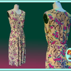 Vintage 1940s novelty print floral and bow dress