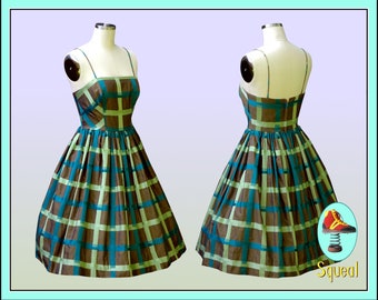 Vestido vintage de los años 50 con estampado geométrico: algodón pulido, corpiño ajustado