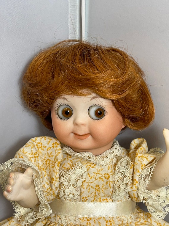 Googly sales doll antique