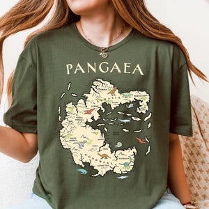 Educational science T-shirt with a vintage "Pangaea" map graphic featuring labeled supercontinent regions and small colorful dinosaurs, ideal for geology fans, paleontology students, or as a unique academic gift.