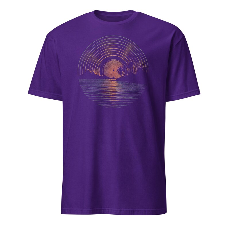 Man wearing a black t-shirt featuring a retro sunset illustration shaped like a vinyl record, showing palm trees, a glowing sun, and reflective ocean waves in warm orange and green tones.