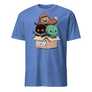 Adopt a Cryptid Shirt Funny Bigfoot Gifts for Monster Hunter Weird Stuff Folk Horror Shirt Heather Royal