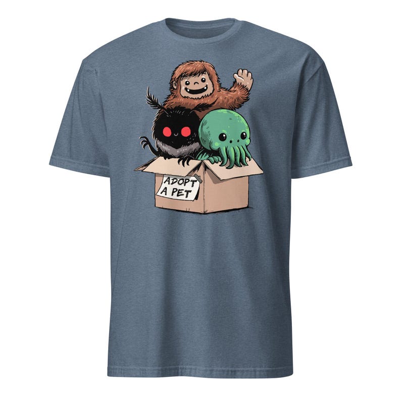 Adopt a Cryptid Shirt Funny Bigfoot Gifts for Monster Hunter Weird Stuff Folk Horror Shirt Heather Indigo