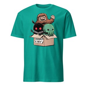 Adopt a Cryptid Shirt Funny Bigfoot Gifts for Monster Hunter Weird Stuff Folk Horror Shirt Jade Dome