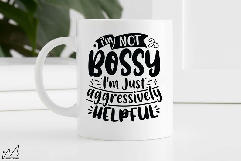 May include: White ceramic mug with a black design that reads "I'm not bossy I'm just aggressively helpful".
