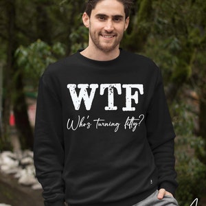 May include: Black sweatshirt with white text that reads "WTF Who's turning fifty?"