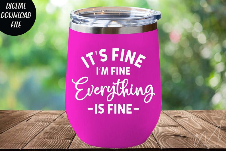 May include: A bright pink stainless steel tumbler with a clear lid, featuring the white printed text IT'S FINE I'M FINE Everything IS FINE. The tumbler has a rounded shape and a metallic silver rim at the top, designed for holding beverages.
