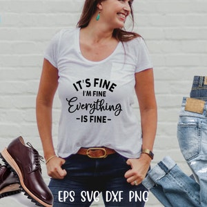May include: A white short-sleeved t-shirt with a pocket and black text that reads IT'S FINE I'M FINE Everything -IS FINE-. The shirt is paired with dark blue jeans, a brown leather belt, and dark burgundy lace-up shoes with thick soles.
