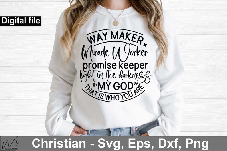May include: A white sweatshirt with a black circle design that says "Way Maker Miracle Worker Promise Keeper Light in the Darkness That is Who You Are My God".