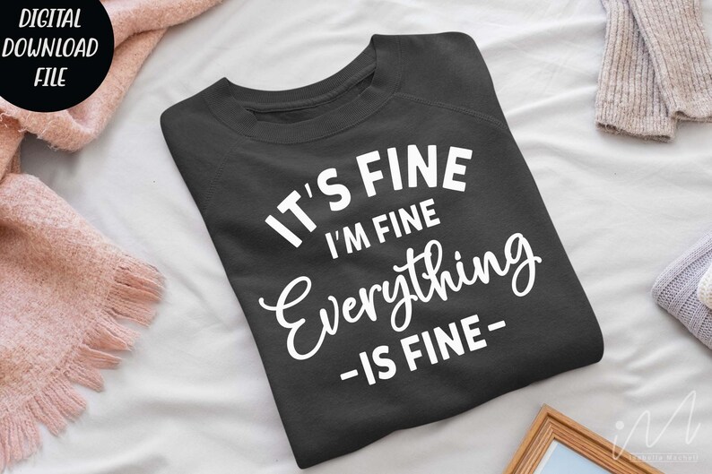 May include: A dark charcoal gray crewneck sweatshirt featuring white screen-printed text that reads IT'S FINE I'M FINE Everything -IS FINE- in a combination of bold sans-serif and cursive script fonts centered on the front of the garment.