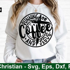 May include: A white sweatshirt with a black circle design that says "Running on Coffee and Jesus" with a cross in the center.