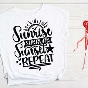 May include: White t-shirt with black text that reads "Sunrise Sunburn Sunset Repeat" with a sun, a bird, and a starfish graphic.