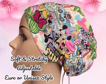 May include: A colorful surgical cap with a cartoon print featuring Disney characters, watermelon slices, and the text "Girls Just Wanna Have Fun". The cap is soft, stretchy, and adjustable. It is available in Euro or unisex style.