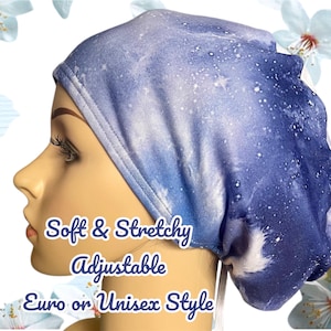 May include: A blue and white galaxy print scrub hat with adjustable ties. The hat is soft and stretchy.  "Soft & Stretchy Adjustable Euro or Unisex Style" is written on the front of the hat.