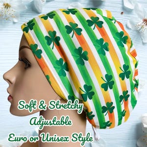 May include: A white, green, and orange striped surgical cap with a shamrock pattern. The cap is soft, stretchy, and adjustable.  Euro or Unisex Style.
