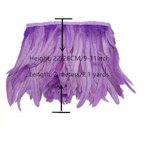 May include: Purple feather trim with a height of 9-11 inches and a length of 2.1 yards. The trim is made of soft feathers and is perfect for adding a touch of elegance to any project.