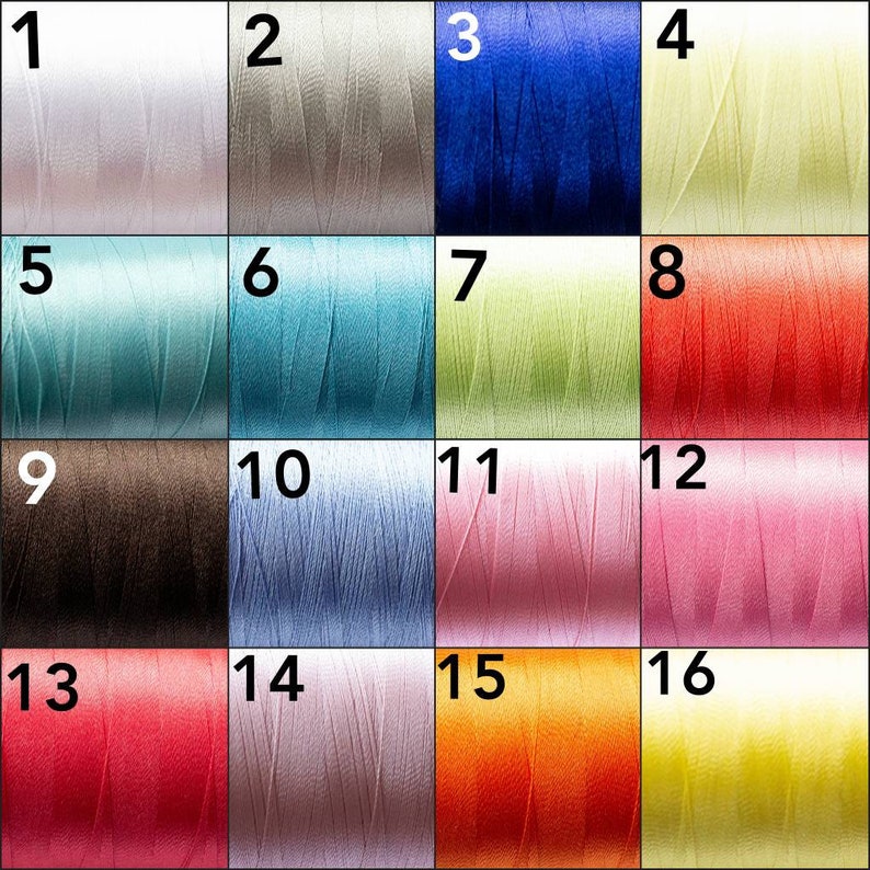 May include: A color chart of 16 different shades of thread spools. The spools are arranged in a 4x4 grid, with each spool numbered from 1 to 16.
