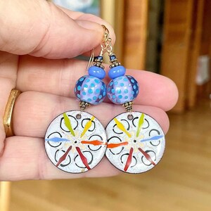 Paintbox.  Enamels, paints, primary colors, whimsy, artist