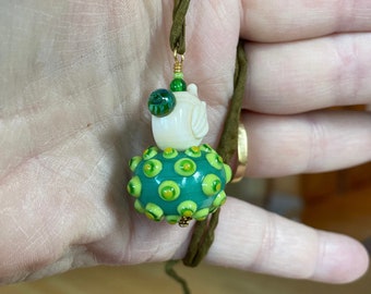 Arty Bird Pendant.  Ivory and green glass, Jari Sheese bead,