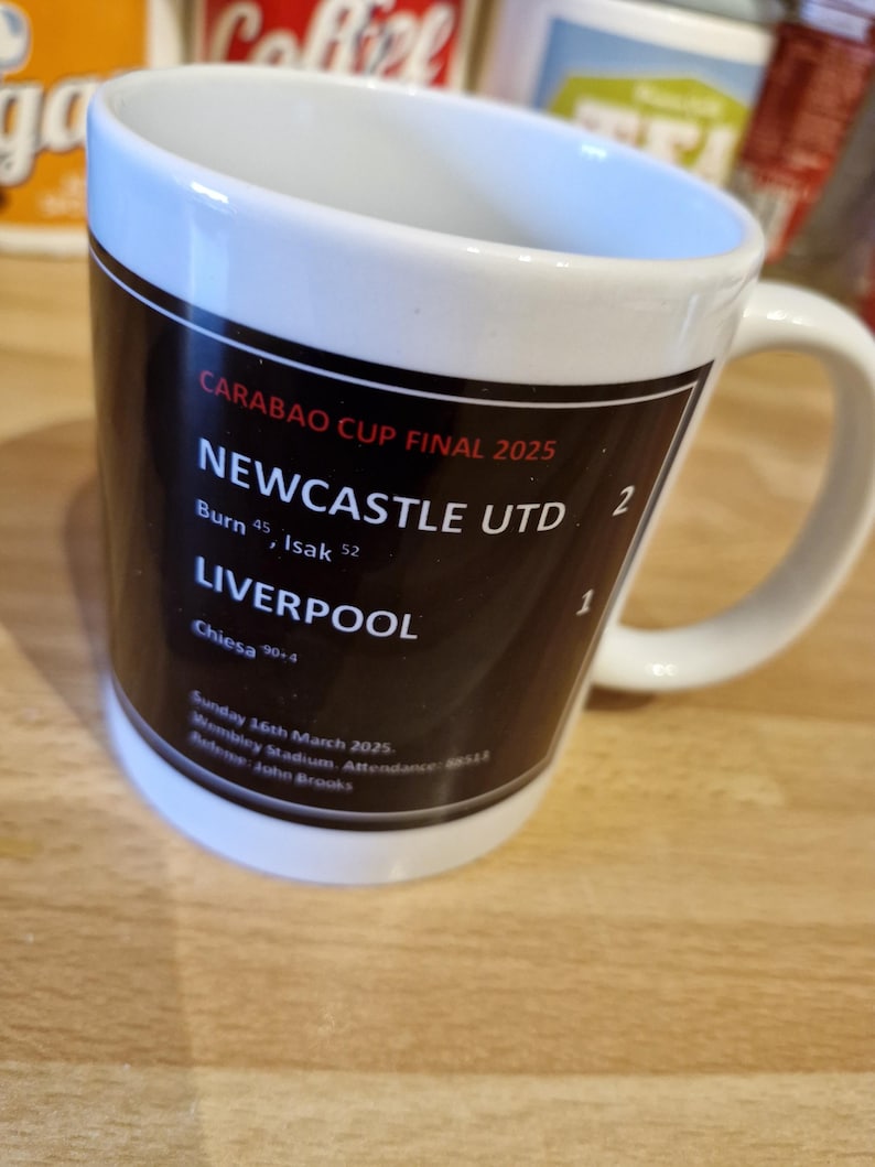Newcastle's 56 year wait for a major trophy ended with a magnificent Carabao Cup win over favourites Liverpool. 
Dan Burn's towering header and Alexander Isak's sublime half volley saw them deservedly lift the Cup despite conceding in added time.
Relive that afternoon every tea time, with our Mug of the Day, featuring all of the match details, scorers, Newcastle team and their route to the Final.
Also makes a great gift for Newcastle fans everywhere.