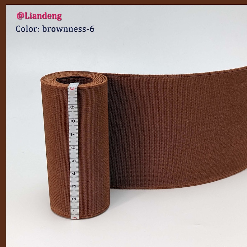 Peut inclure: Un &eacute;lastique brun enroul&eacute; avec un ruban &agrave; mesurer &agrave; c&ocirc;t&eacute;. L'&eacute;lastique mesure environ 23 cm de long.
