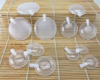 Squeake assembly sample packs -25mm, 35mm, 40mm, 45mm, a total of four sizes, 12 per pack. toys special squeaker .Noise Makers