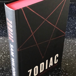 Zodiac by Sam Wilson . Signed and lined by the author . From a numbered limited edition of just 750 of which this is number 68.