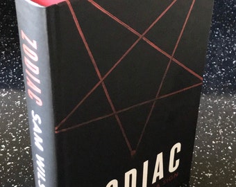 Zodiac by Sam Wilson . Signed and lined by the author . From a numbered limited edition of just 750 of which this is number 68.