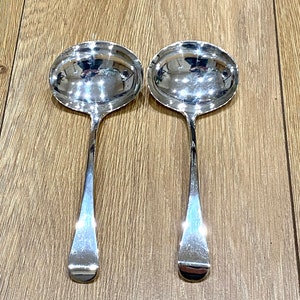 Georgian antique Silver pair of Sauce ladles Both Hallmarked for London 1809 maker Thomas Dicks.
