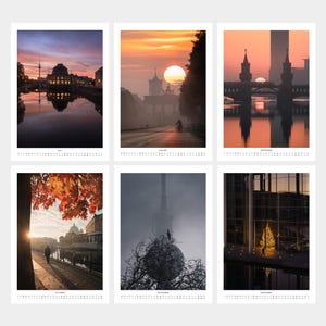 Peut inclure: Un calendrier mural pr&eacute;sentant six photographies distinctes de paysages urbains de Berlin, incluant la tour de t&eacute;l&eacute;vision, la porte de Brandebourg et le pont Oberbaum, avec des grilles mensuelles imprim&eacute;es en noir sous chaque image.