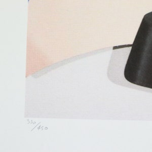 May include: A white print with a black and white abstract design. The print is numbered 350/450.