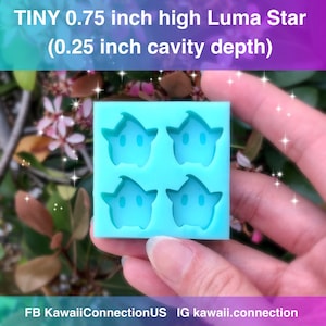 May include: A blue silicone mould with four cavities shaped like Luma Stars from the Super Mario franchise. The mould is 0.75 inches high and has a 0.25 inch cavity depth.  TINY 0.75 inch high Luma Star (0.25 inch cavity depth) FB KawaiiConnectionUS IG kawaii.connection
