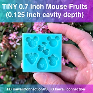May include: A blue silicone mold with seven cavities for making small fruit and mouse-shaped candies. The mold is 0.7 inches wide and has a cavity depth of 0.125 inches.