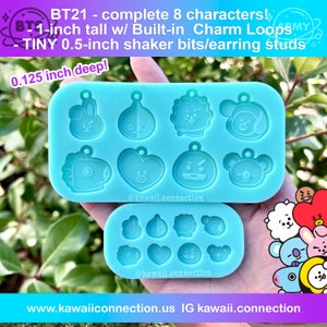 May include: Two blue silicone molds for making resin charms. The molds are 1 inch tall and feature 8 different BT21 characters. The molds are 0.125 inches deep and have built-in charm loops. The text "@kawaii.connection" is printed on the bottom of each mold.