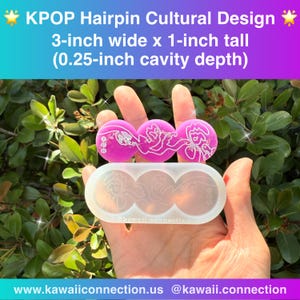 May include: A set of KPOP hairpin molds and finished hairpins. The text on the image reads "KPOP Hairpin Cultural Design" and "3-inch wide x 1-inch tall (0.25-inch cavity depth)". The finished hairpins are pink with white designs.