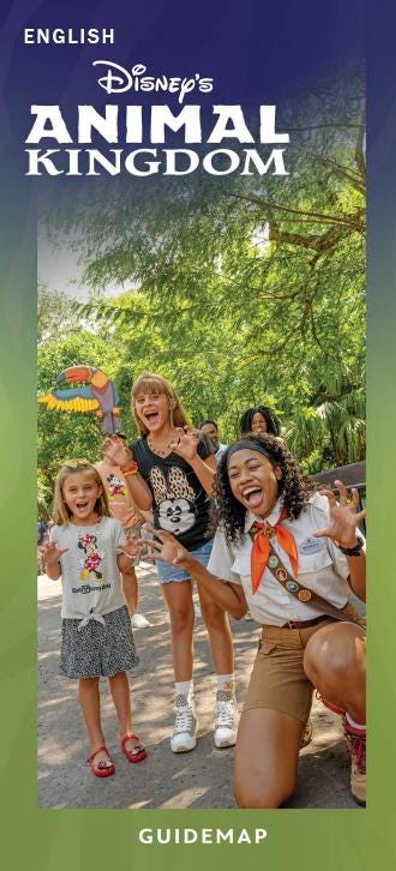 A Disney's Animal Kingdom English guidemap brochure showing children and a guide making playful claw gestures.