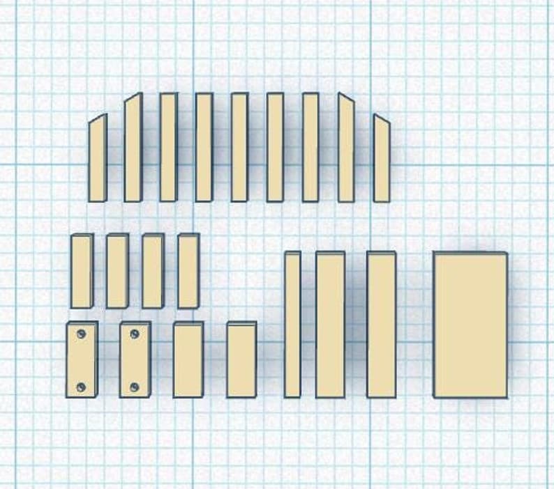 A blueprint or layout diagram on a blue grid background showing various rectangular and angled wooden pieces required for a woodworking project.