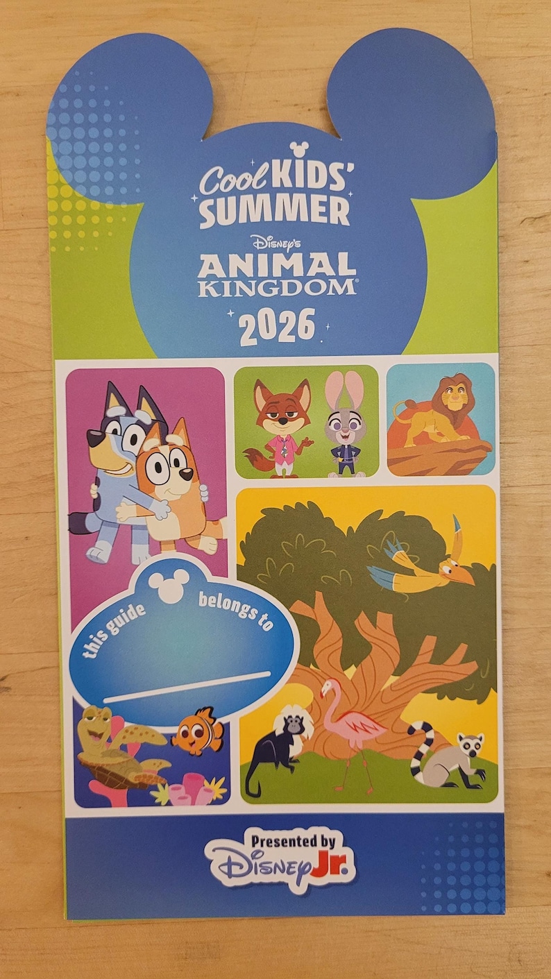 The Cool Kids Summer 2026 guide map for Animal Kingdom features Bluey characters, Zootopia characters, and various safari animals.