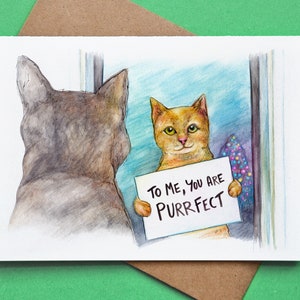 May include: A watercolor illustration of two cats. One cat is looking at the other cat who is holding a sign that says "To me, you are purrfect".