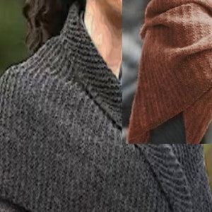 May include: A gray knitted shawl with a textured pattern. The shawl is draped over a person's shoulders.