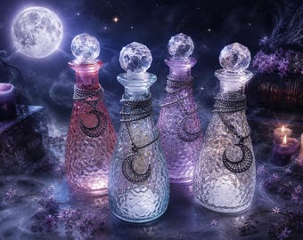 May include: Four glass bottles with textured surfaces and faceted crystal-style stoppers. Each bottle is wrapped with a silver-toned chain featuring a crescent moon pendant. The bottles are coloured in shades of pink, light blue, purple, and clear glass.