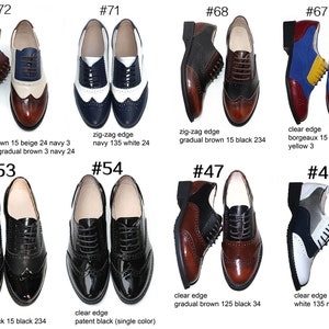 May include: Ten pairs of women's oxfords in various colors and patterns. The shoes have a lace-up closure and a wingtip design. The shoes are arranged in two rows of five.