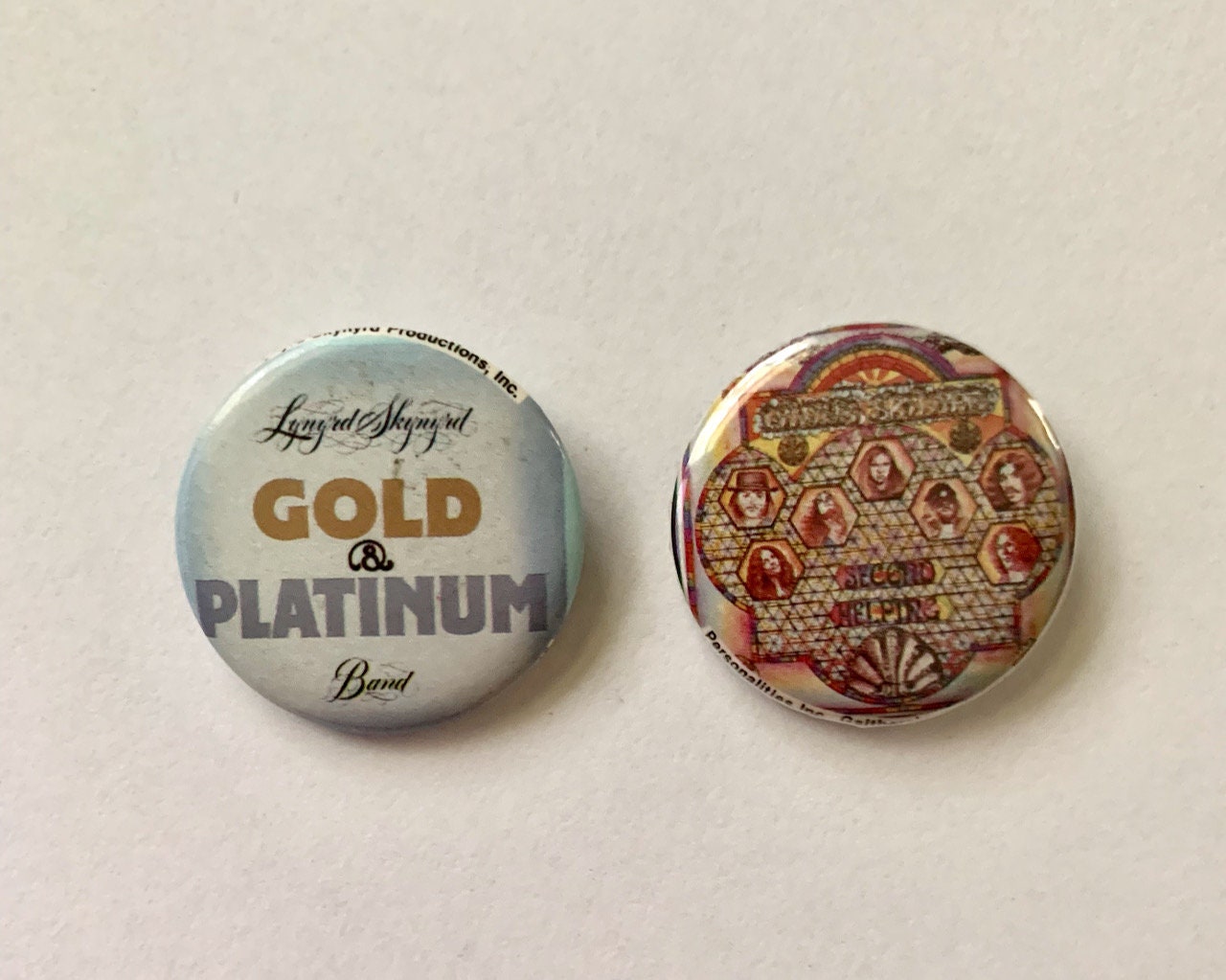 5 1970's LYNYRD SKYNYRD Pin Back Buttons Pic from back cover of 1st Album 5 1970's LYNYRD SKYNYRD Pin Back Buttons Pic from back cover of 1st Album