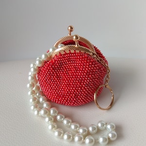 Ganchillo rojo brillante con cuentas auricular titular monedero Chapstick caso Carryall monedero Viaje joyería corchete bolsa Cordón organizador madrastra regalo